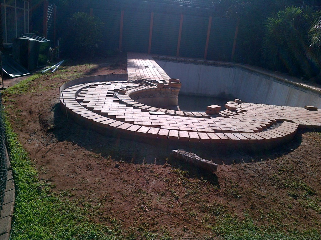 above ground pool on asphalt